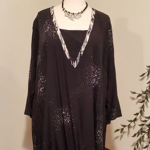 Black tunic with dainty splashes of accent colors